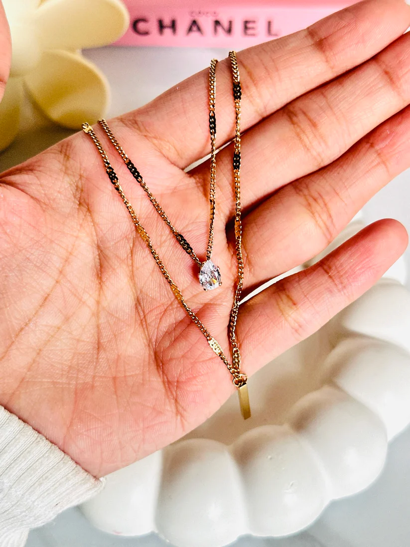 Luxury Gold Plated Chain Necklace Elegant gold pendant with intricate design for women – perfect for weddings, parties, and gifting. Shop premium gold jewelry online.