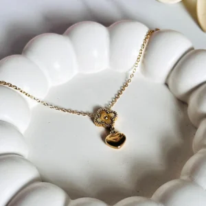 Elegant gold pendant with intricate design for women – perfect for weddings, parties, and gifting. Shop premium gold jewelry online.